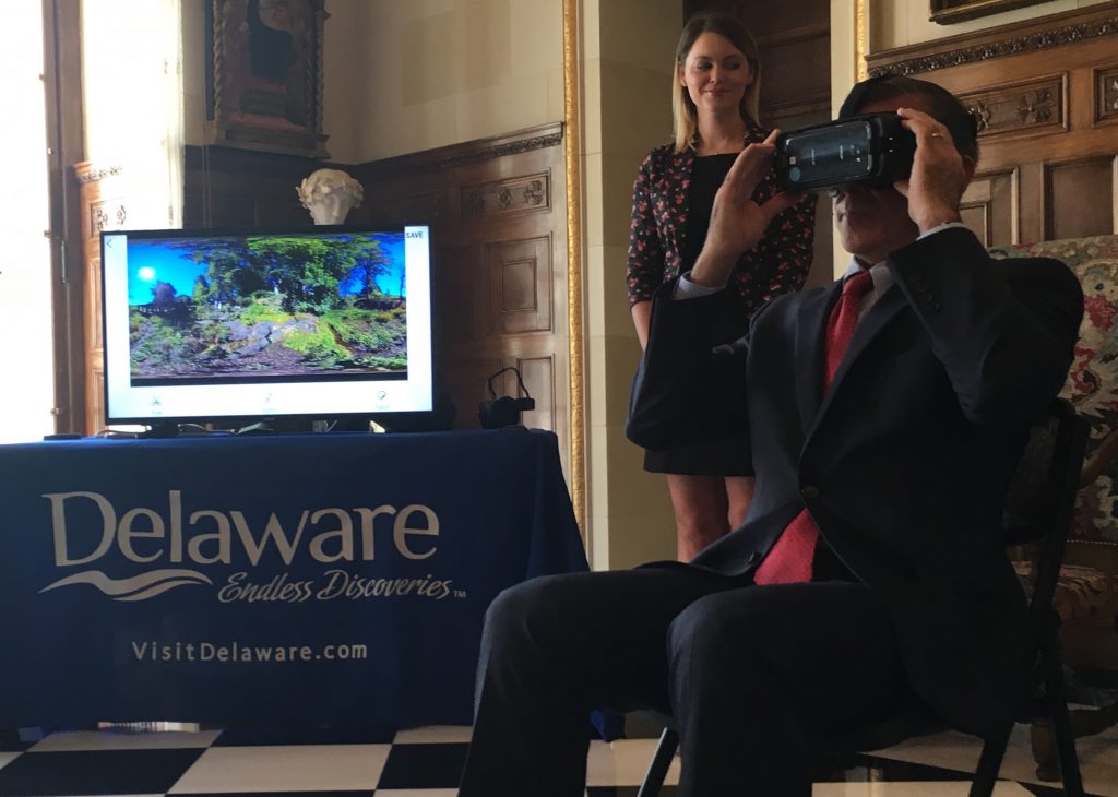 IMG_E0517 Delaware Gov. John Carney takes a virtual tour of the state with the Delaware 360 video tourism officials are now using to promote the state. (Mark Eichmann/WHYY)