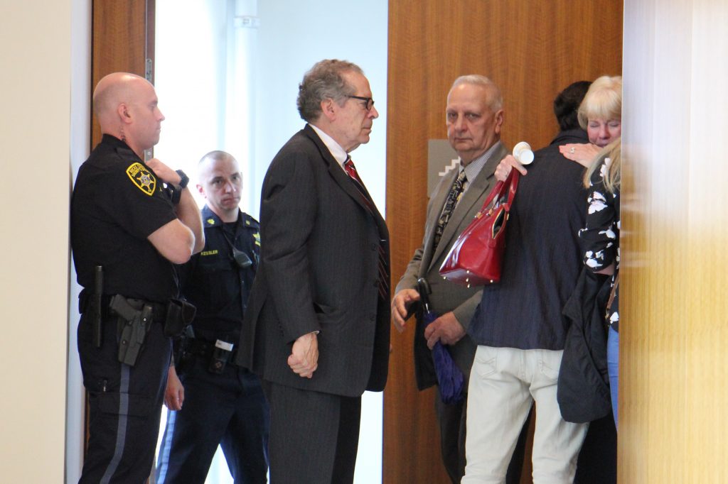 Image uploaded from iOS Family of Jimi Patrick, one of four men murdered by Cosmo DiNardo, leave the Bucks County Courtroom where DiNardo was sentenced to four consecutive life terms. (Emma Lee/WHYY)