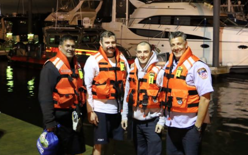 Screen Shot 2018-05-20 at 11.25.26 AM The FDNY boat crew that rescued five people from the Raritan Bay in Monmouth County, N.J. on Friday night. (Courtesy of FDNY)