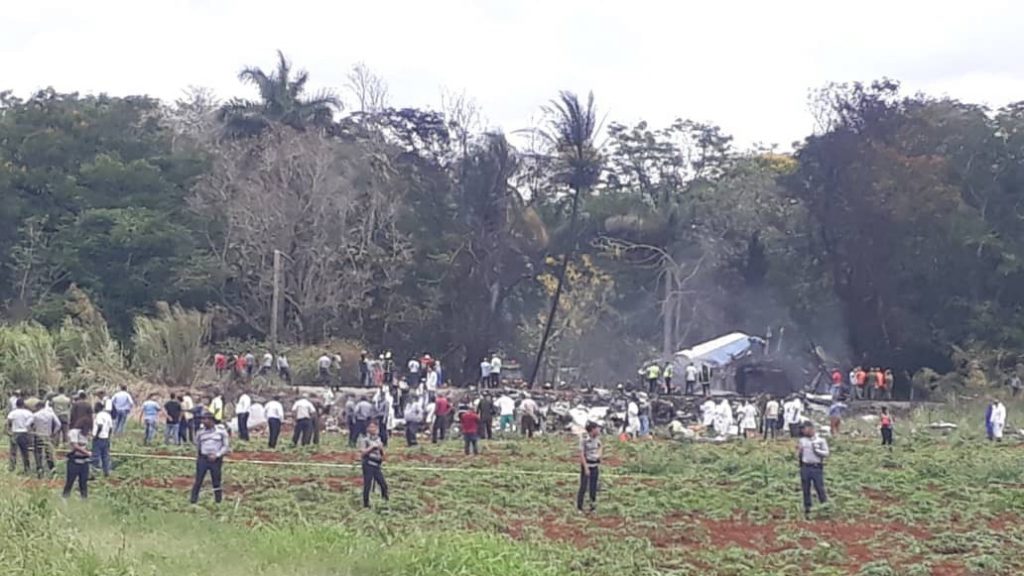 First responders and law enforcement gather in the field where an airliner crashed after takeoff Friday, just outside the international airport in Havana, Cuba. First responders and law enforcement gather in the field where an airliner crashed after takeoff Friday, just outside the international airport in Havana, Cuba. (Andrea Rodriguez/AP)