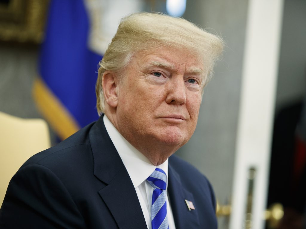 A federal judge ruled Wednesday that President Trump and his aides cannot block critics on Twitter. A federal judge ruled Wednesday that President Trump and his aides cannot block critics on Twitter. (Evan Vucci/AP)
