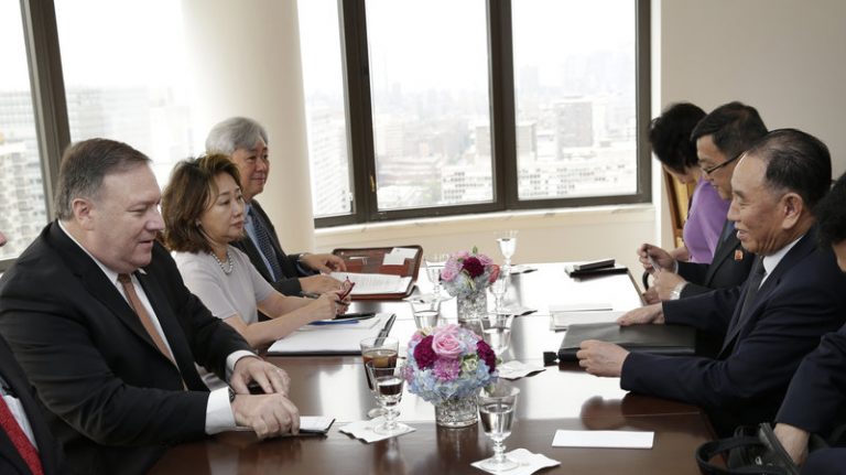 Kim Yong Chol, former North Korean military intelligence chief and one of Kim Jong Un's closest aides (second from right) and U.S. Secretary of State Mike Pompeo sit across from one another before the start of a meeting on Thursday in New York (Seth Wenig/AP)