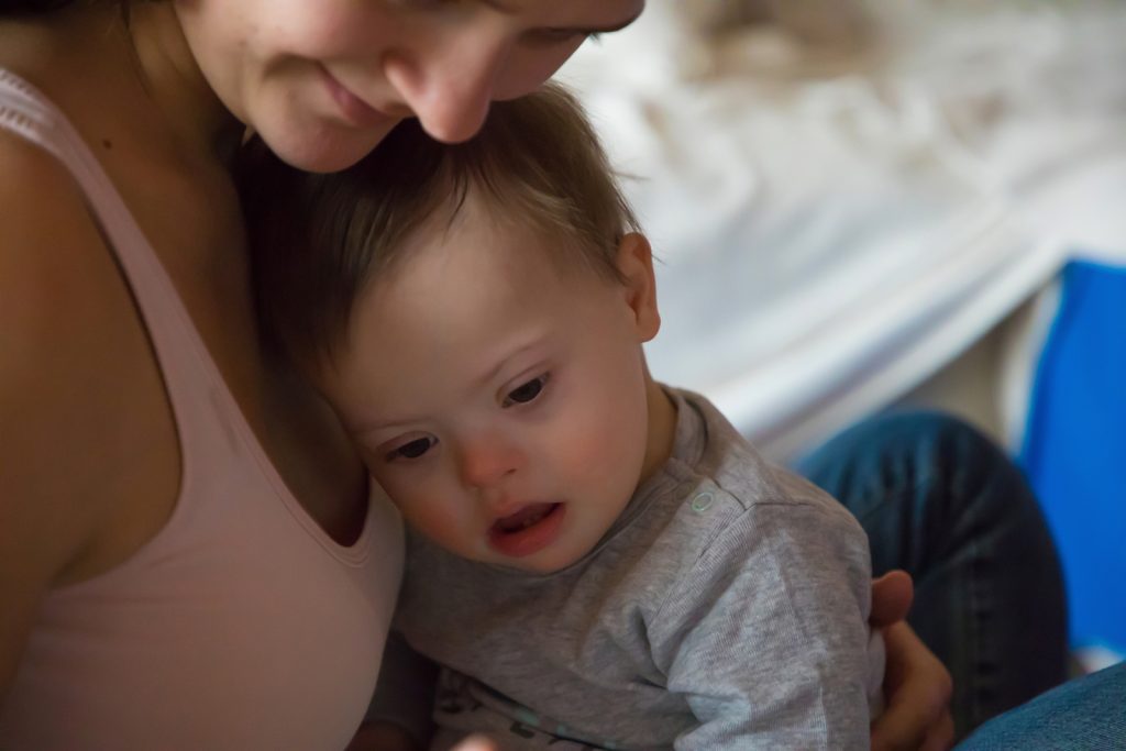 Portrait of cute baby boy with Down syndrome with his mother In April, the Pa. House passed a bill that would ban abortions in cases where there was a prenatal diagnosis of Down syndrome. The legislation is dividing the special needs community. (Big Stock Photo)