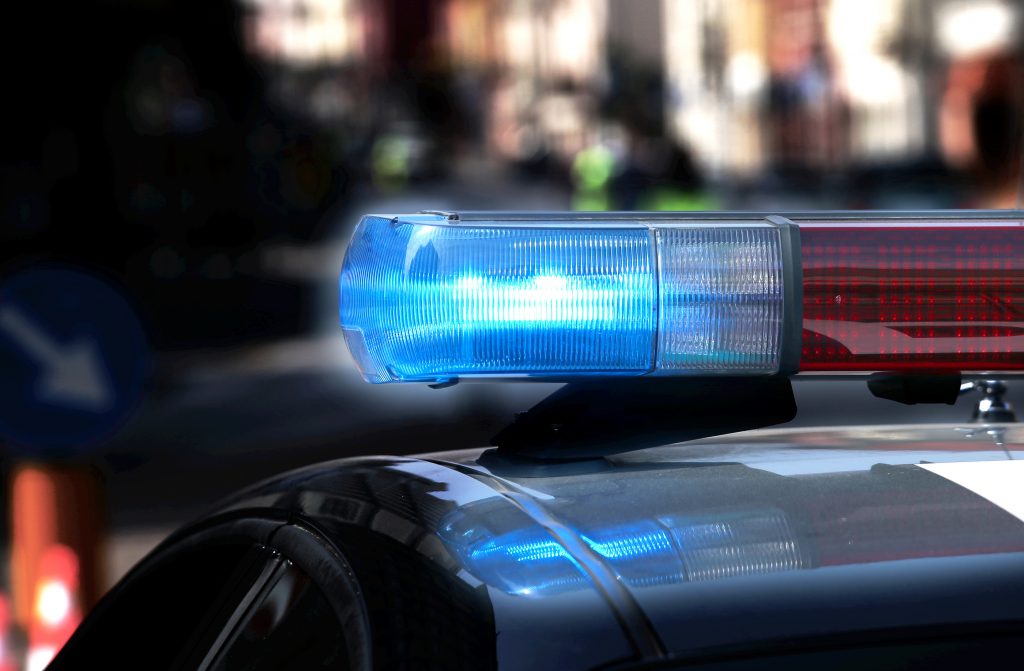 Police Patrol Car With Flashing Lights And Siren On During The N Police patrol car with flashing lights and siren on