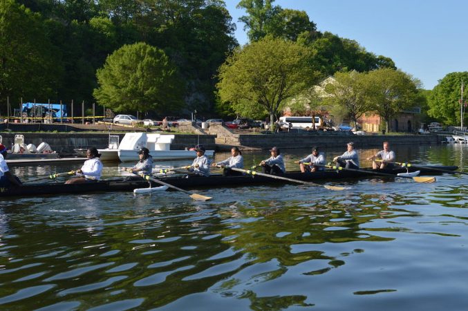 The Philly Council Dad Vail crew during practice on the Schuylkill Wednesday morning (Tom MacDonald/WHYY)