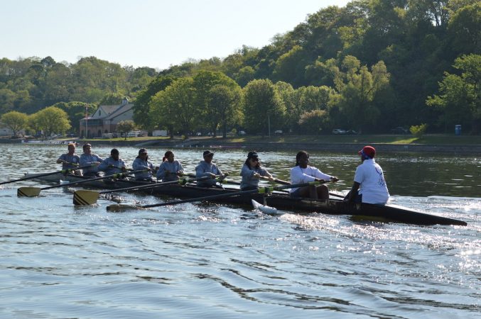 The Philly Council Dad Vail crew during practice on the Schuylkill Wednesday morning (Tom MacDonald/WHYY)
