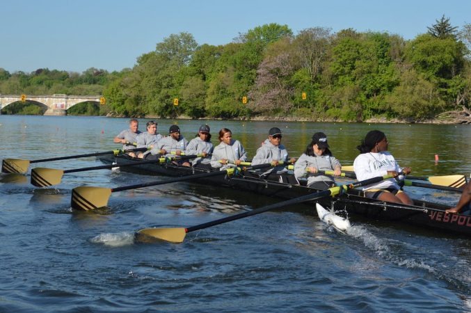 The Philly Council Dad Vail crew during practice on the Schuylkill Wednesday morning (Tom MacDonald/WHYY)