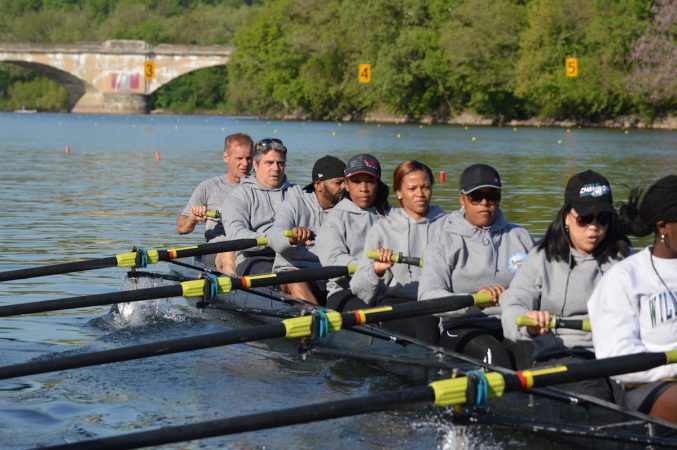 The Philly Council Dad Vail crew during practice on the Schuylkill Wednesday morning (Tom MacDonald/WHYY)