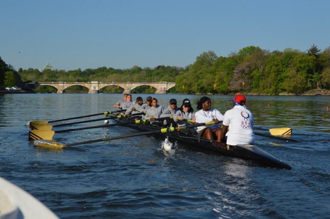 The Philly Council Dad Vail crew during practice on the Schuylkill Wednesday morning (Tom MacDonald/WHYY)