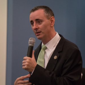 US Rep. Brian Fitzpatrick of Pennsylvania's 8th district talks to a crowd of constituents during a town hall in Bensalem, PA August 22nd 2017.