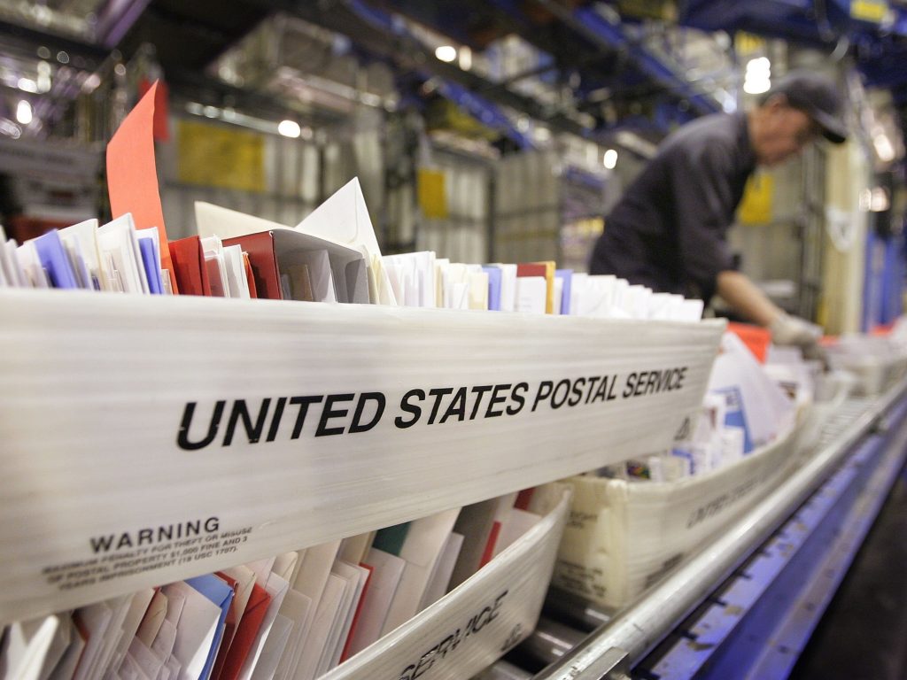 A Chicago man has been charged with mail fraud and mail theft after allegedly changing UPS’s corporate mailing address to the address of his own apartment. Here, mail is sorted at Chicago’s main post office in 2006. A Chicago man has been charged with mail fraud and mail theft after allegedly changing UPS's corporate mailing address to the address of his own apartment. Here, mail is sorted at Chicago's main post office in 2006. (Scott Olson/Getty Images)