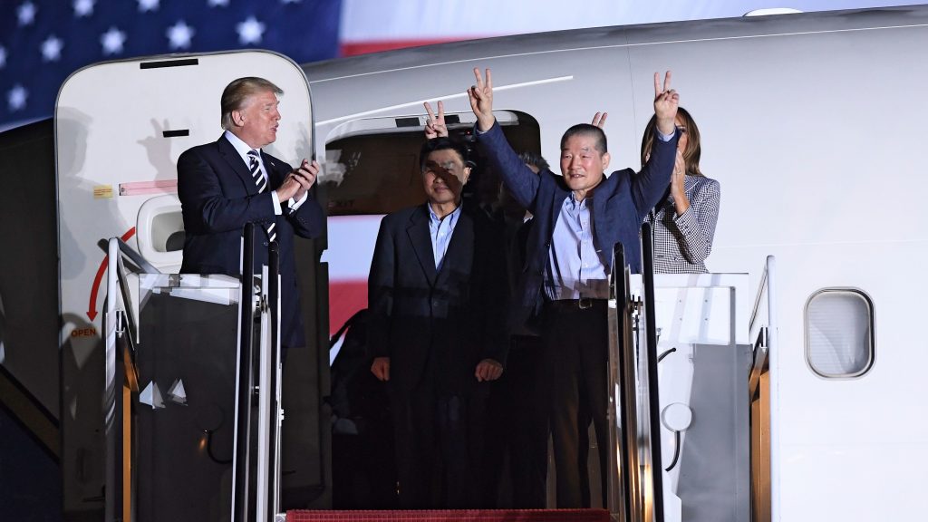 President Trump applauds as Kim Dong Chul (2nd R) gestures upon his return with Kim Hak Song (C) and Tony Kim (behind) after they were freed by North Korea, at Joint Base Andrews in Maryland. President Trump applauds as Kim Dong Chul (2nd R) gestures upon his return with Kim Hak Song (C) and Tony Kim (behind) after they were freed by North Korea, at Joint Base Andrews in Maryland.