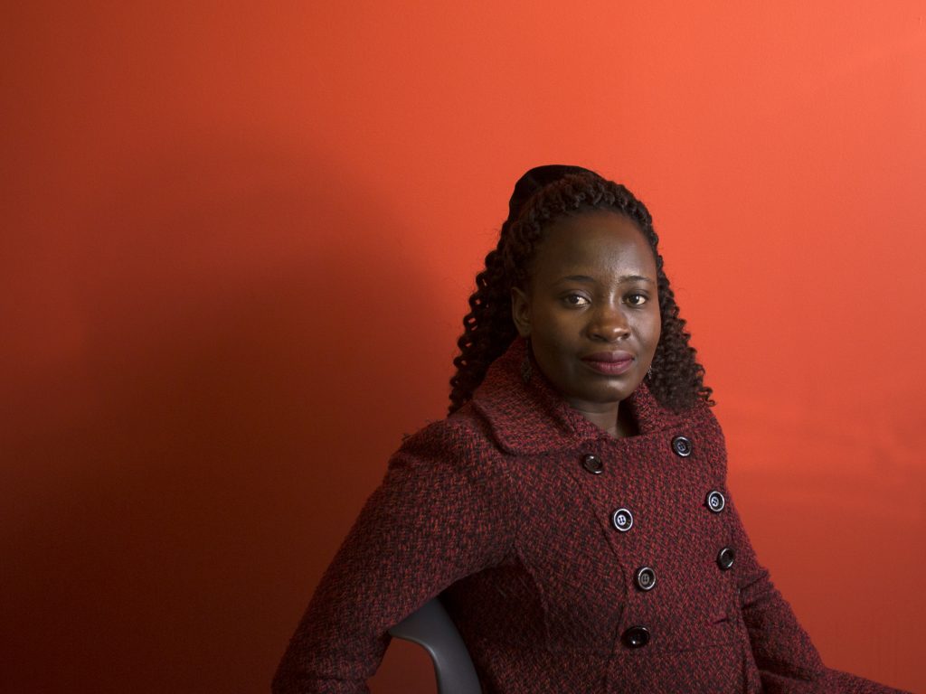 Melvine Ouyo is a reproductive health nurse at Family Health Options Kenya. She visited Washington, D.C., to discuss how the clinic has lost funding because it would not agree to the terms of President Trump’s executive order banning U.S. aid to any health organization in another country that provides abortions, advocates or makes referrals for the procedure. Melvine Ouyo is a reproductive health nurse at Family Health Options Kenya. She visited Washington, D.C., to discuss how the clinic has lost funding because it would not agree to the terms of President Trump's executive order banning U.S. aid to any health organization in another country that provides abortions, advocates or makes referrals for the procedure. (Emily Matthews/NPR)