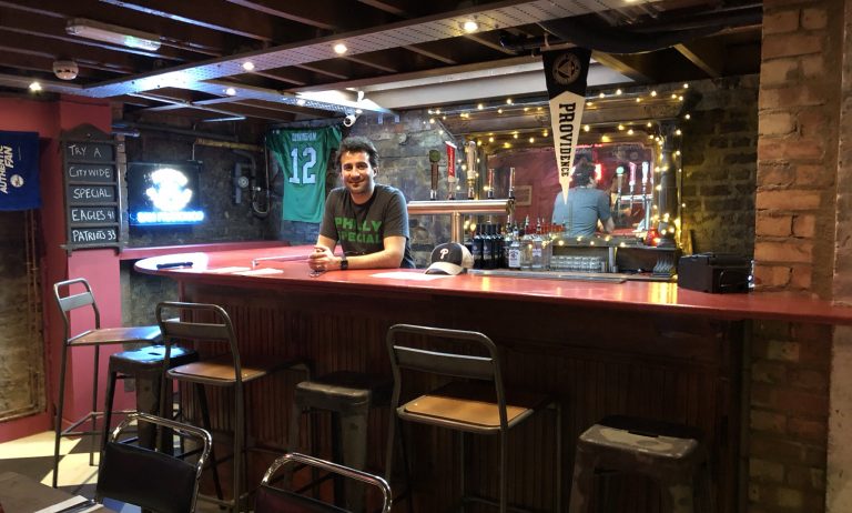 Owner JP Teti stands behind the basement bar at Passyunk Avenue, a Philly-themed dive bar in London