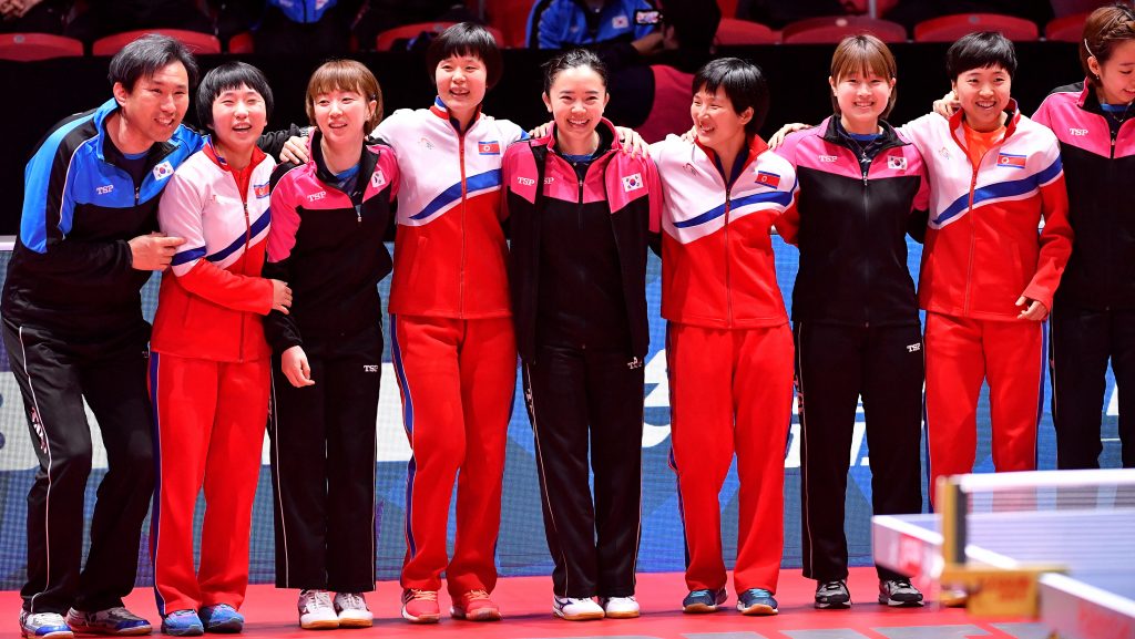 The South Korean and North Korean teams receive an ovation Thursday at the World Team Table Tennis Championships in Halmstad, Sweden. The players elected to form a unified Korean team for the tournament’s semifinal round. The South Korean and North Korean teams receive an ovation Thursday at the World Team Table Tennis Championships in Halmstad, Sweden. The players elected to form a unified Korean team for the tournament's semifinal round. (TT News Agency/Reuters)