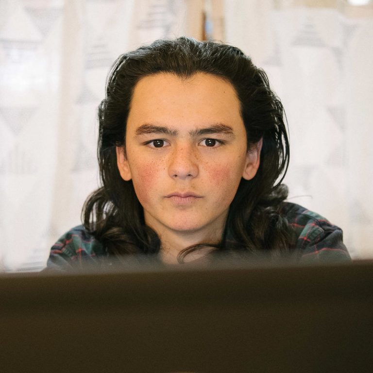 Sam Oozevaseuk Schimmel, 18, has grown up in both Alaska and Washington state. He is an advocate for Native Alaskan youth. (Kiliii Yuyan for NPR)