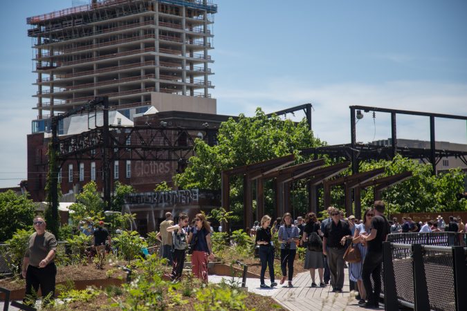 Philadelphians of all ages gather to inaugurate the first quarter mile of the Philadelphia Rail Park June 14th 2018. (Emily Cohen for WHYY)