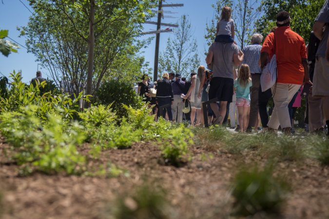Philadelphians of all ages gather to inaugurate the first quarter mile of the Philadelphia Rail Park June 14th 2018. (Emily Cohen for WHYY)