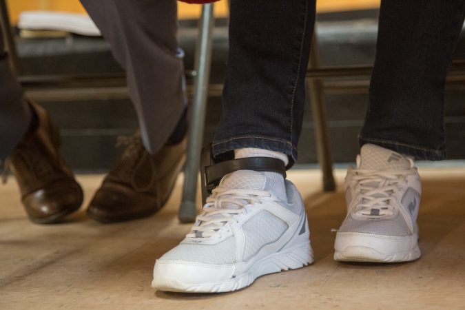 As a condition of her release, Debbie Africa must wear an ankle monitoring device for six months. (Emily Cohen for WHYY)