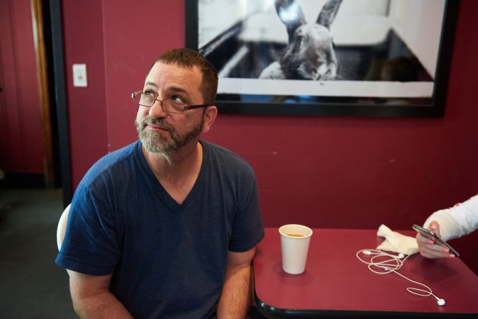 Tony Drago of Trenton, N.J., grew up on Clinton Avenue, three blocks away from the historic Roebling Wire Works building where a shooting early Sunday left one person dead and 22 people injured. (Natalie Piserchio for WHYY)