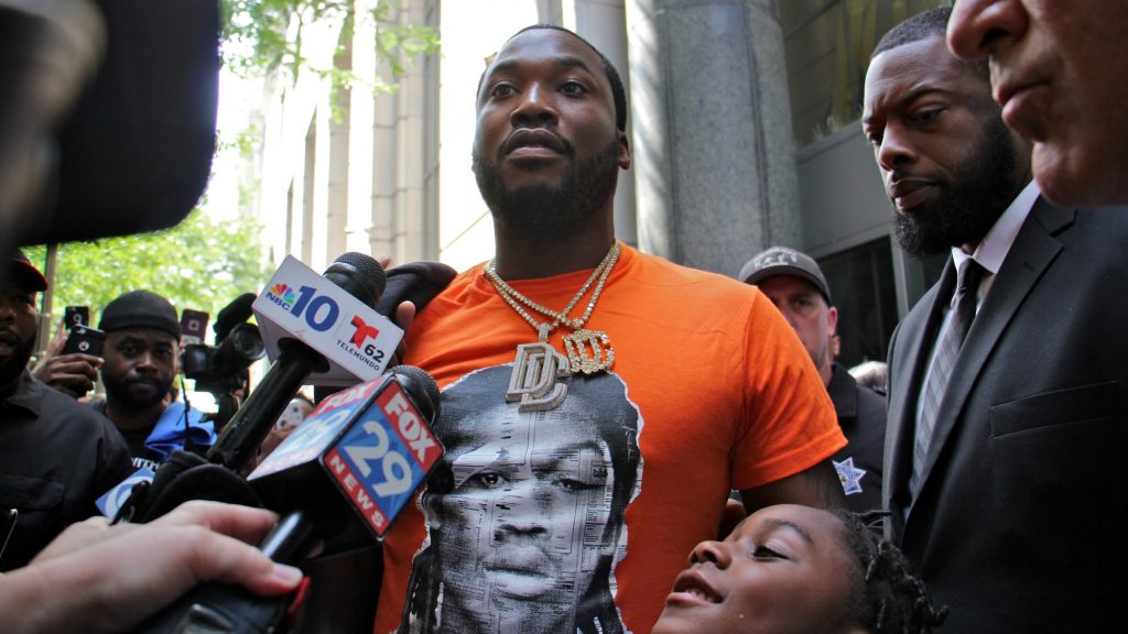 2018 06 18-e lee-meek mill-philadelphia criminal justice center-rally for meek mill exit Meek Mill leaves the Criminal Justice Center with his attorneys after asking a judge to throw out a 10-year-old conviction on gun and drug charges. (Emma Lee/WHYY)