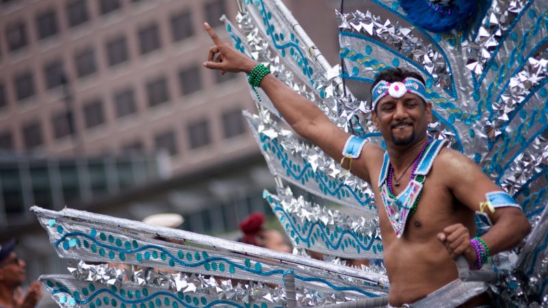 A Carnaval dance group from Trinidad performs during the Juneteenth Parade, in Center City, on Saturday. (Bastiaan Slabbers for WHYY)