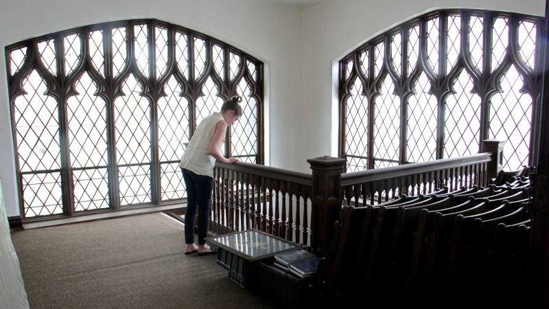 A stairwell is used for storage at Wharton-Wesley United Methodist Church. The congregation has dwindled from a high of 700 to about 150 members. (Emma Lee/WHYY)