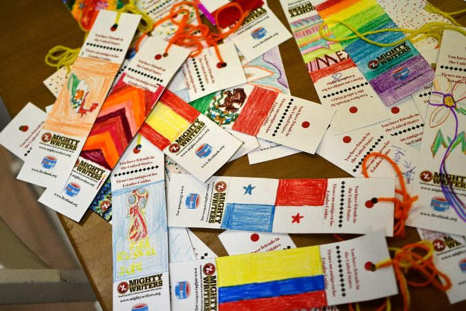Bookmarks designed by Robert, 14, during a workshop at Mighty Writers El Futuro, to go with books send to immigrant families at the Berks County Detention Center. (Bastiaan Slabbers for WHYY)