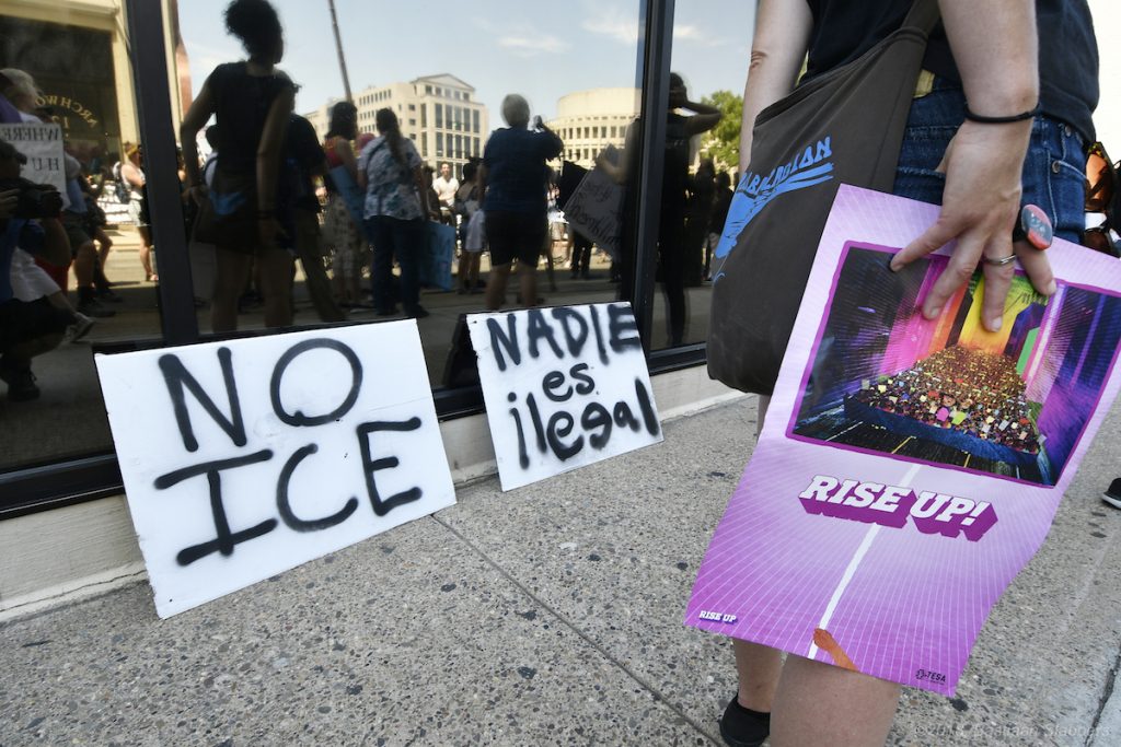 2018 06 30_15__BS11148 – – End Family Detention Rally – Philadelphia – — 20180630___©2018_ Protesters rally at the U.S. Immigration and Customs Enforcement field office at 8th and Cherry streets after a rally in Philadelphia on June 30. (Bastiaan Slabbers for WHYY)