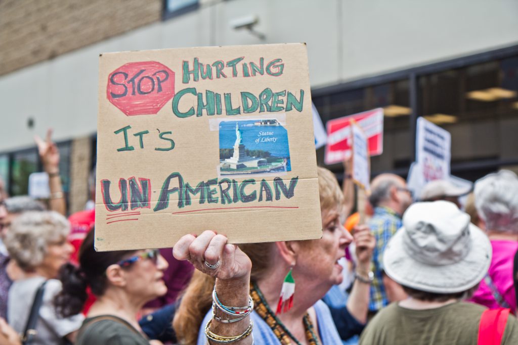 2018 6 1 kpaynter aclu protest ice headquarters immigrantion-6 Abbie Hyde protests the practice of separating children from their families outside of the Center City offices of ICE in Philadelphia. (Kimberly Paynter/WHYY)