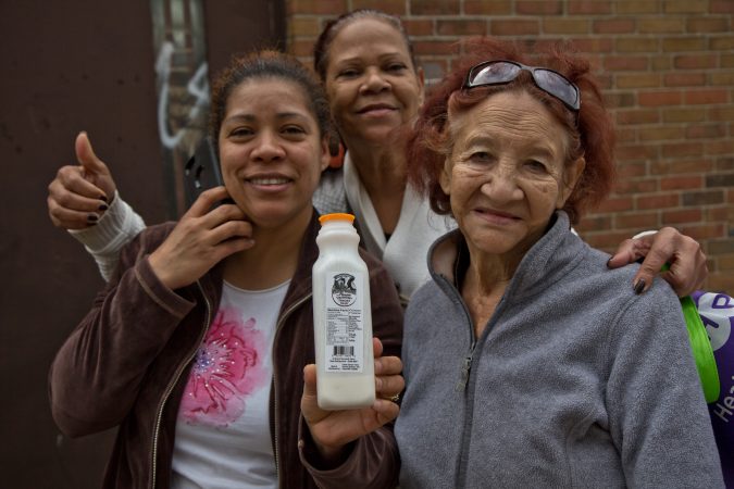 Philabundance clients said they love the drinkable yogurt they receive with their produce. (Kimberly Paynter/WHYY)