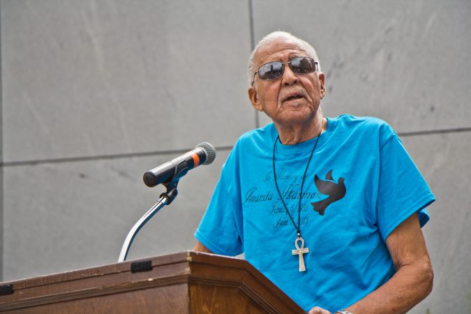 Juanita Harmon’s brother remembers her at the dedication of a memorial for those lost in the building collapse five years ago. (Kimberly Paynter/WHYY)