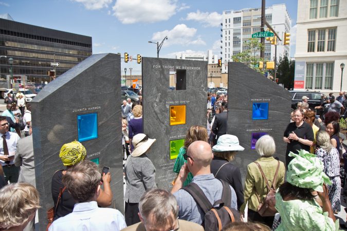 A memorial is dedicated on the fifth anniversary of a building collapse at 22nd and Market streets that killed six people. (Kimberly Paynter/WHYY)