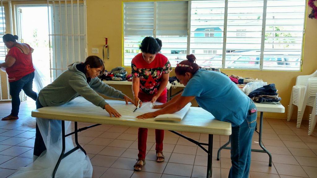 Puerto Rico Mosquito Net Making Rosita Canboh and community members in Barrio Las Vegas, Cayey, make mosquito nets for their neighborhood. Photo by Fernando Silva
