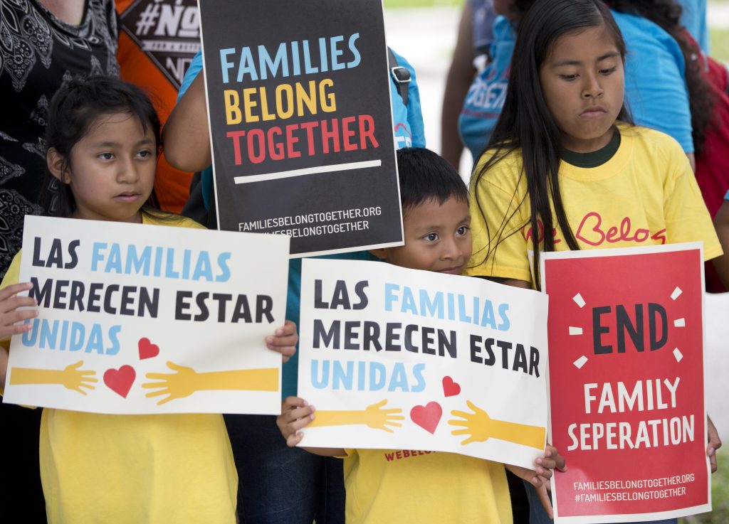 Florida Immigration Protest A group of children hold up signs during a demonstration in front of the Immigration and Customs Enforcement (ICE) offices, Friday, June 1, 2018, in Miramar, Fla. The children were taking part in the Families Belong Together Day of Action, where demonstrators in cities across the U.S. protested against separating immigrant children from their families. (Wilfredo Lee/AP Photo)