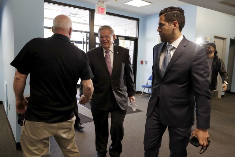 U.S. Sen. Bob Menendez is greeted by a poll worker as he arrives at the Harrison Community Center to cast his vote in the New Jersey primary election Tuesday, June 5, 2018, in Harrison, N.J. (Julio Cortez/AP Photo)