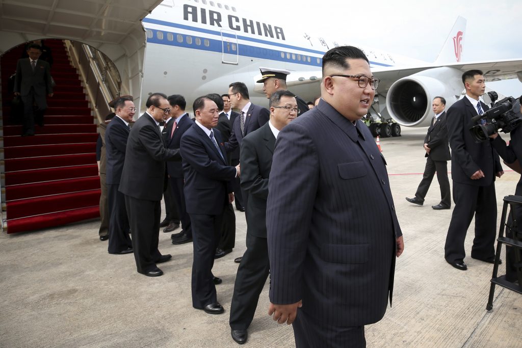 Kim Jong Un In this photo released by the Ministry of Communications and Information of Singapore, North Korean leader Kim Jong Un, right, arrives at the Changi International Airport, Sunday, June 10, 2018, in Singapore ahead of a summit with U.S. President Donald Trump. (Ministry of Communications and Information of Singapore via AP)