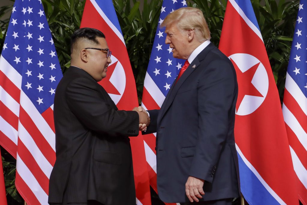 Donald Trump, Kim Jong Un U.S. President Donald Trump shakes hands with North Korea leader Kim Jong Un at the Capella resort on Sentosa Island Tuesday, June 12, 2018 in Singapore. (AP Photo/Evan Vucci)