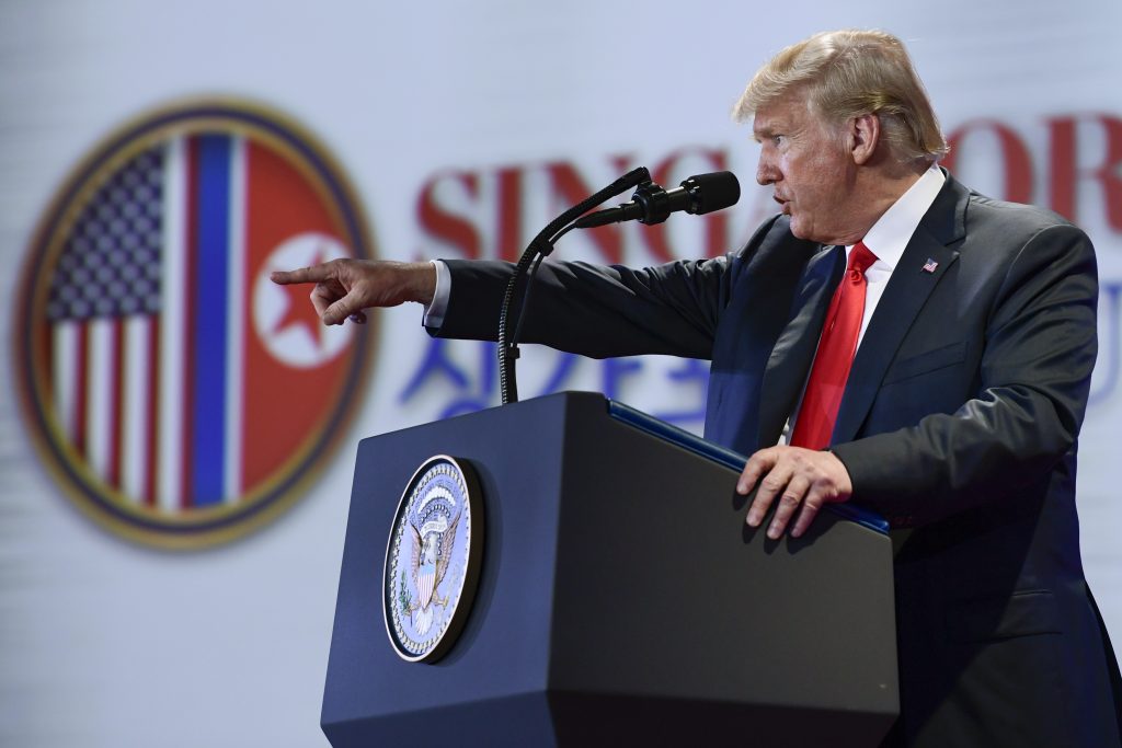 Donald Trump U.S. President Donald Trump answers questions about the summit with North Korea leader Kim Jong Un during a press conference at the Capella resort on Sentosa Island Tuesday, June 12, 2018 in Singapore.