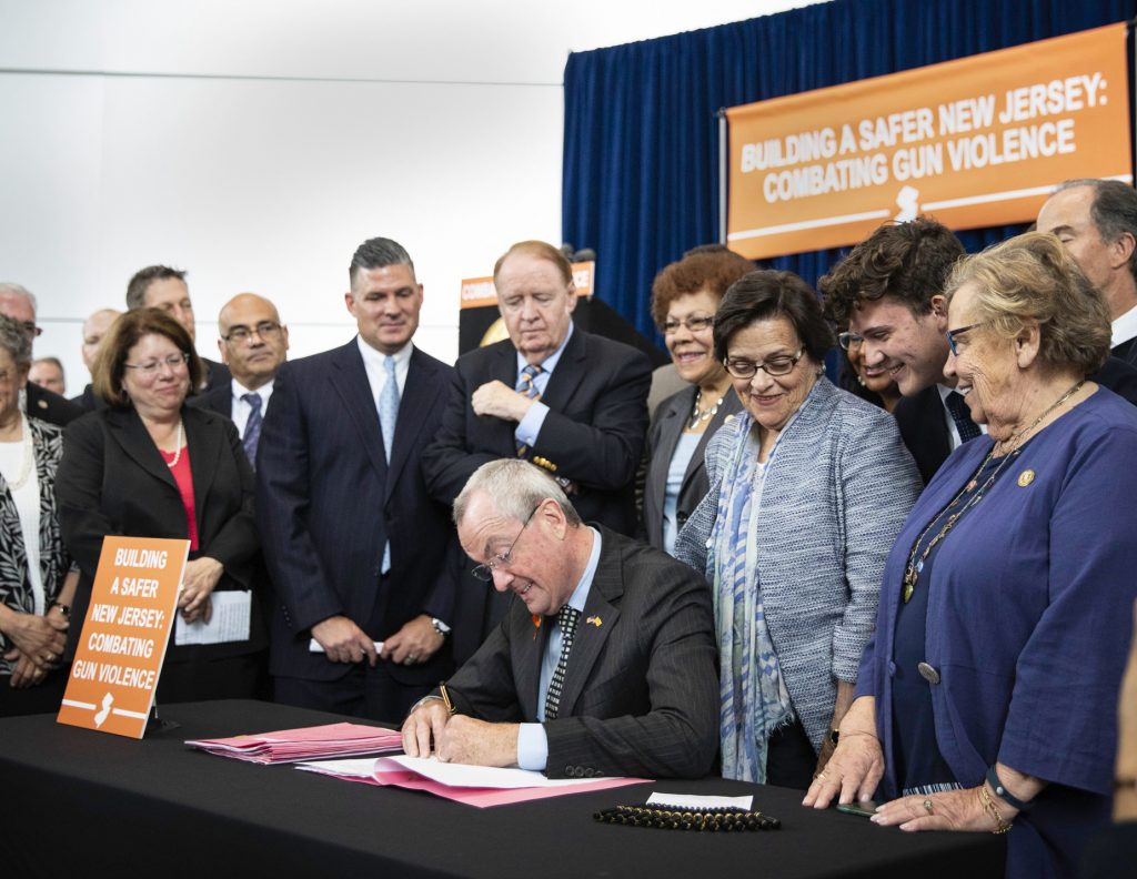 Gun Restrictions New Jersey Gov. Phil Murphy signs several gun-safety bills at the Richard J. Hughes Justice Complex Atrium in Trenton Wednesday. The half-dozen new gun-control laws tighten the state's already strict statutes. (Edwin J. Torres/New Jersey Governor's Office via AP)