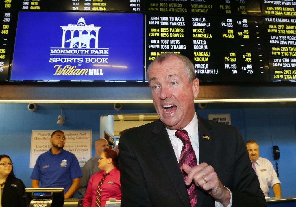 New Jersey Governor Phil Murphy, arrives to make the first wager with Monmouth Park Sports Book at Monmouth Park Racetrack. Thursday, June 14, 2018 in Oceanport, NJ. (Noah K. Murray/AP Photo)