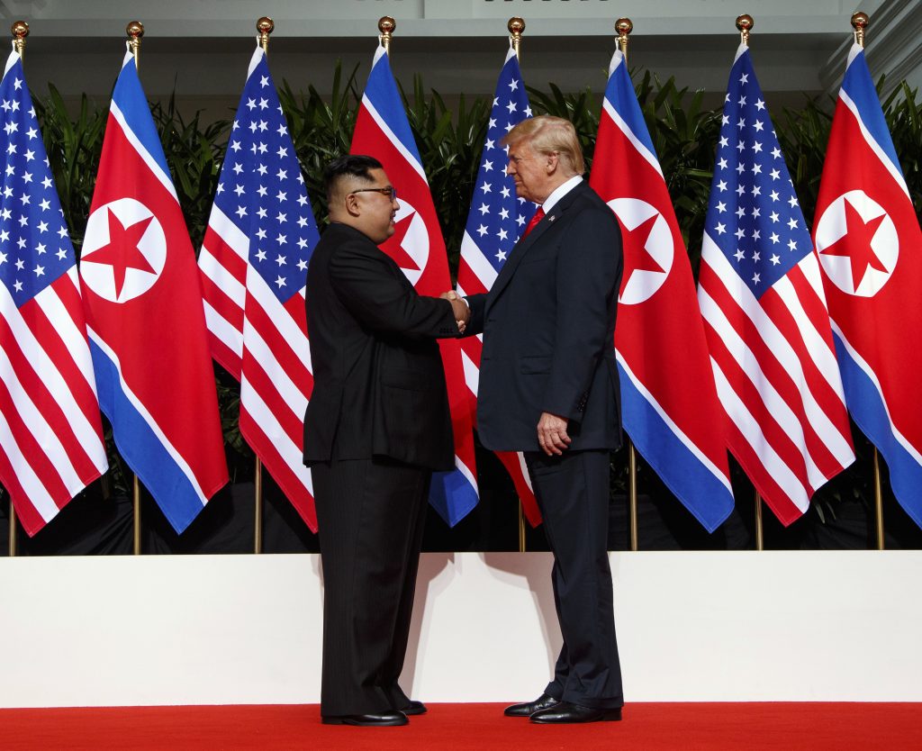 Donald Trump, Kim Jong Un In this June 12, 2018, file photo, North Korean leader Kim Jong Un and U.S. President Donald Trump shake hands prior to their meeting on Sentosa Island in Singapore. (Evan Vucci/AP Photo, File)