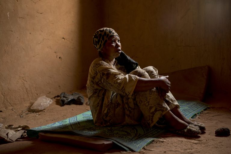 Janet Kamara, from Liberia, sits during an interview conducted in an International Organization for Migration transit center in Arlit, Niger on Saturday, June 2, 2018. Kamara was expelled from Algeria, and left stranded in the Sahara while pregnant. 