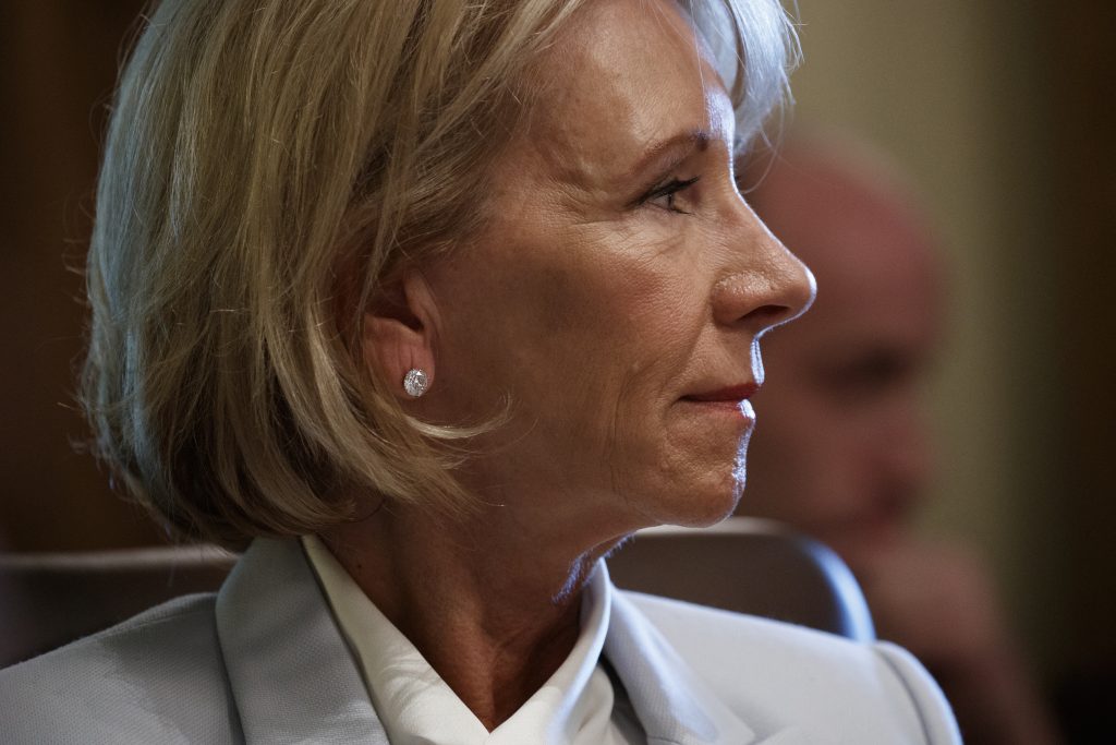 Betsy DeVos Secretary of Education Betsy DeVos listens as President Donald Trump speaks during a cabinet meeting at the White House, Thursday, June 21, 2018, in Washington. (Evan Vucci/AP Photo)