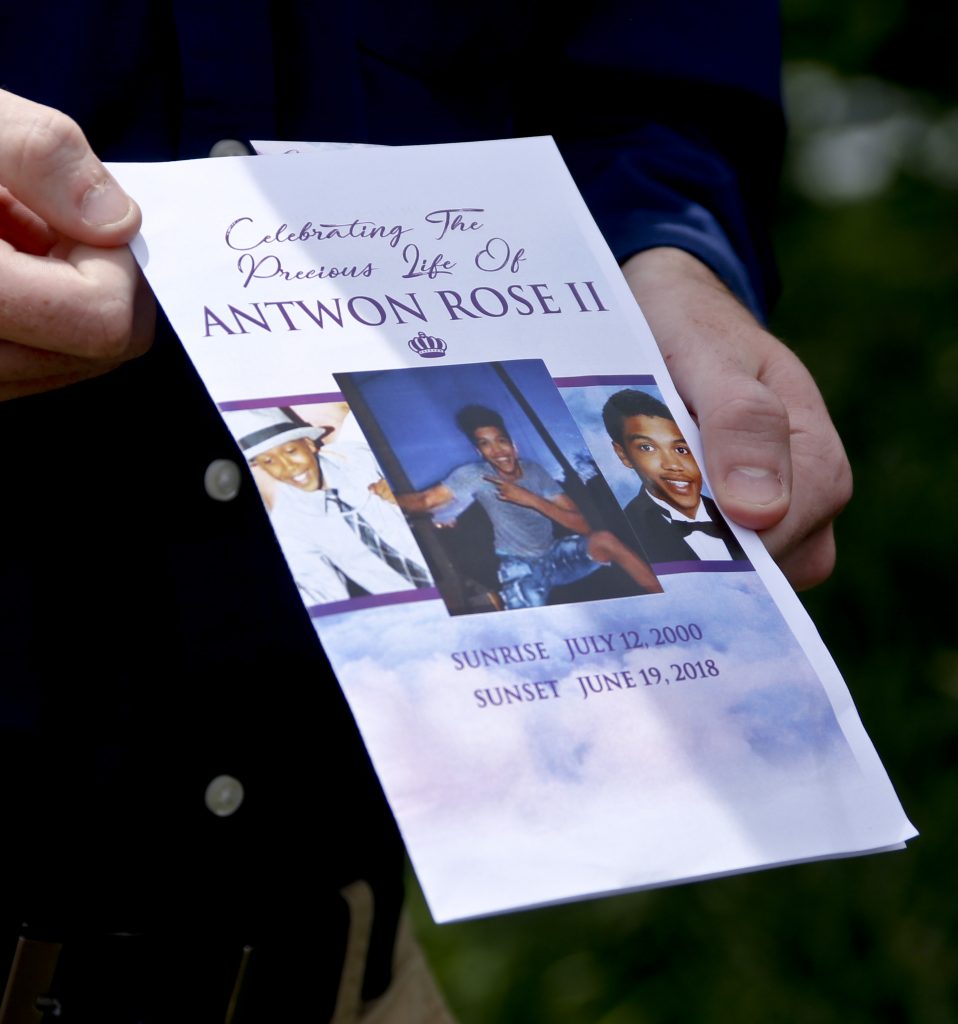 Kyle Fogarty, Antwon Rose Jr. Kyle Fogarty shows the program for the funeral for Antwon Rose Jr. on Monday, June 25, 2018, in Swissvale, Pa. Rose was fatally shot by a police officer seconds after he fled a traffic stop June 19, in the suburb of East Pittsburgh. Fogarty said he was a classmate of Rose and had to attend the service. (Keith Srakocic/AP Photo)