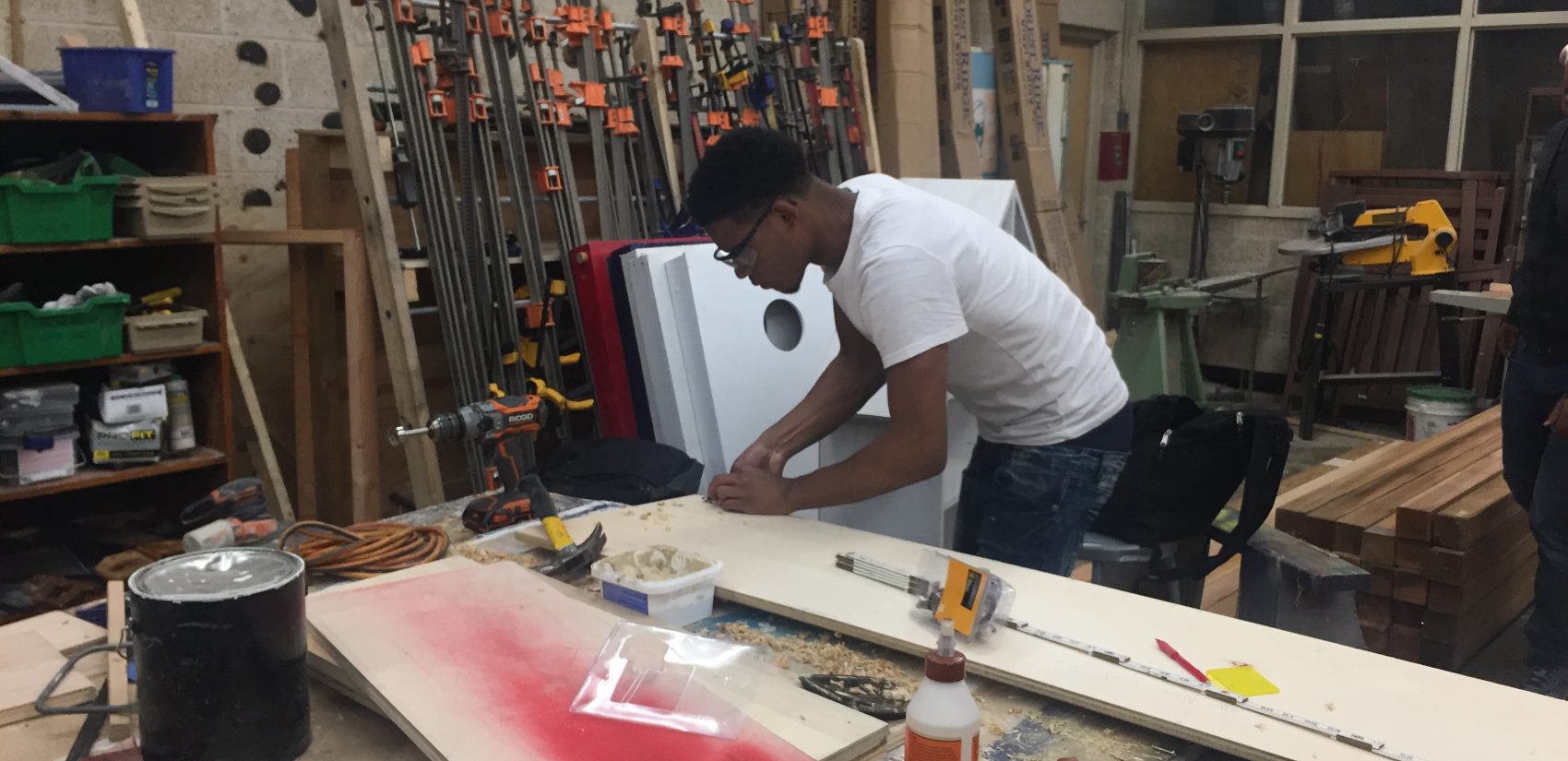 A student in Mac Emerson's construction tech class at William Penn works on a project. (Cris Barrish/WHYY)