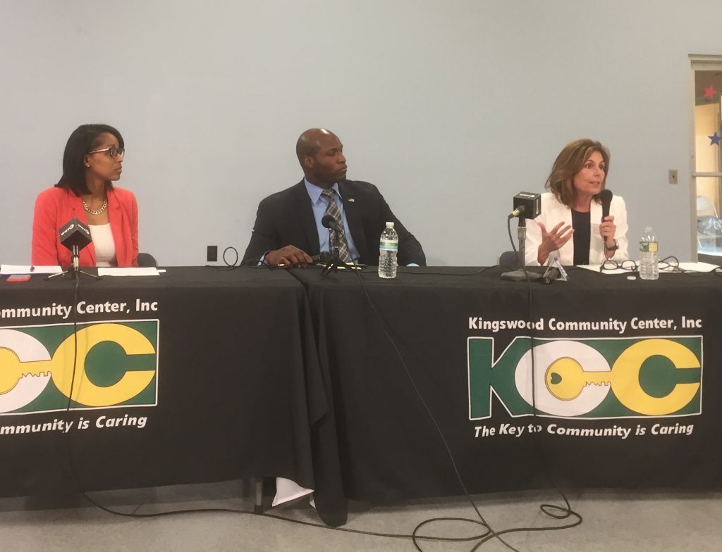 IMG_4232 Three of four Democratic candidates for Delaware Attorney General debated in Wilmington. Seated left to right are Lakresha Roberts, Chris Johnson and Kathy Jennings.(Zoe Read/WHYY)