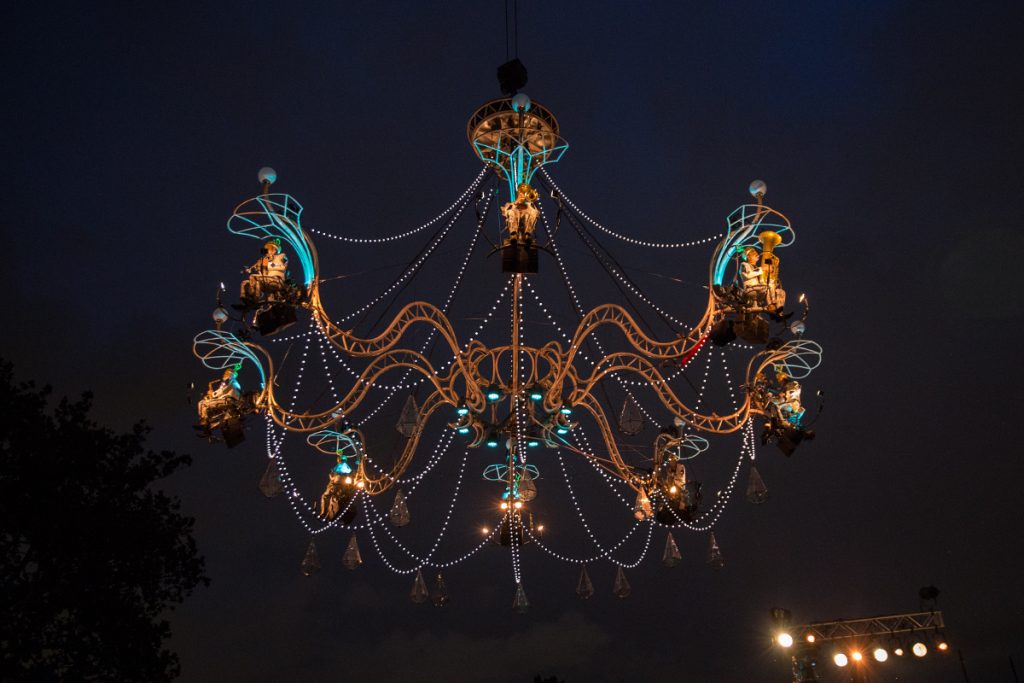 PIFA_cristal_palace_llazarski_06062018_02 Eight musicians play on the chandelier as it moves over the stage, crowd and the Schuylkill River. (Lindsay Lazarski/WHYY)