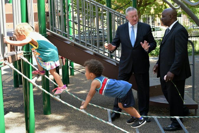Major Jim Kenney asks Rev. Mark Tyler, of Mother Bethel AME Church to speak during a ceremony as the city officially announces the development of Bethel Burying Ground Historic Site Memorial at Weccacoe Playground, in South Philadelphia, on Tuesday June 12, 2018.  (Bastiaan Slabbers for WHYY)