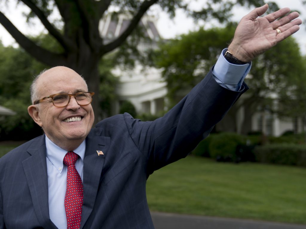 Rudy Giuliani, an attorney for President Donald Trump, waves to people during White House Sports and Fitness Day on the South Lawn of the White House, on Tuesday in Washington. Rudy Giuliani, an attorney for President Donald Trump, waves to people during White House Sports and Fitness Day on the South Lawn of the White House, on Tuesday in Washington.